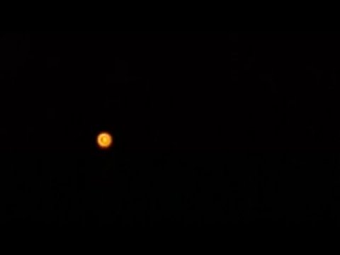 Title Mystery Orange Ball in sky